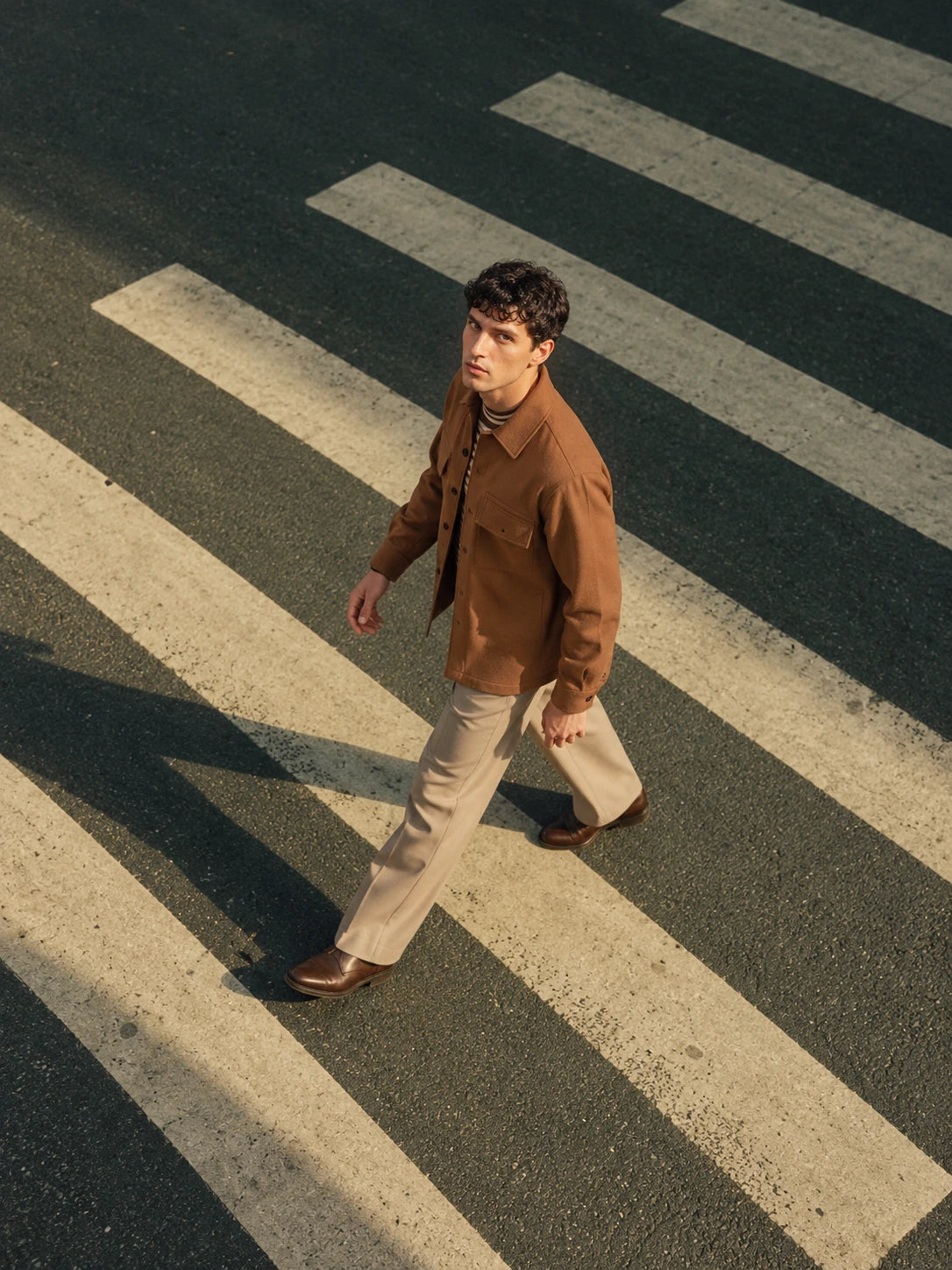 Camel tailoring at a city crosswalk