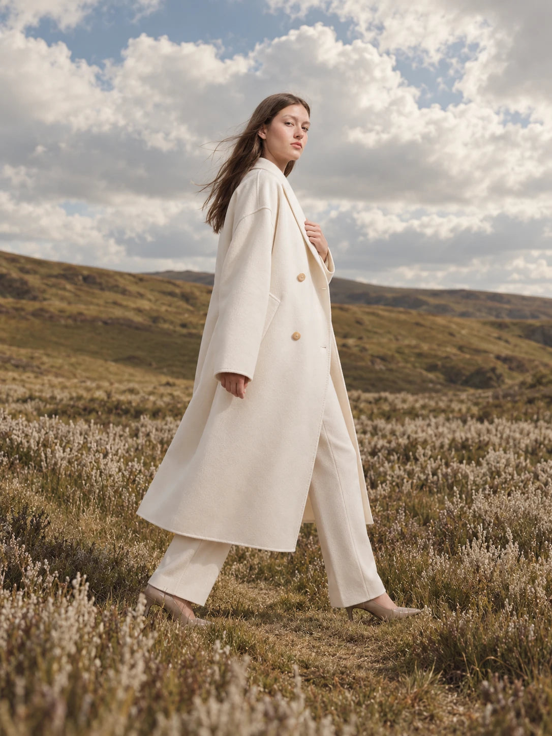 Ivory coat in a heather landscape